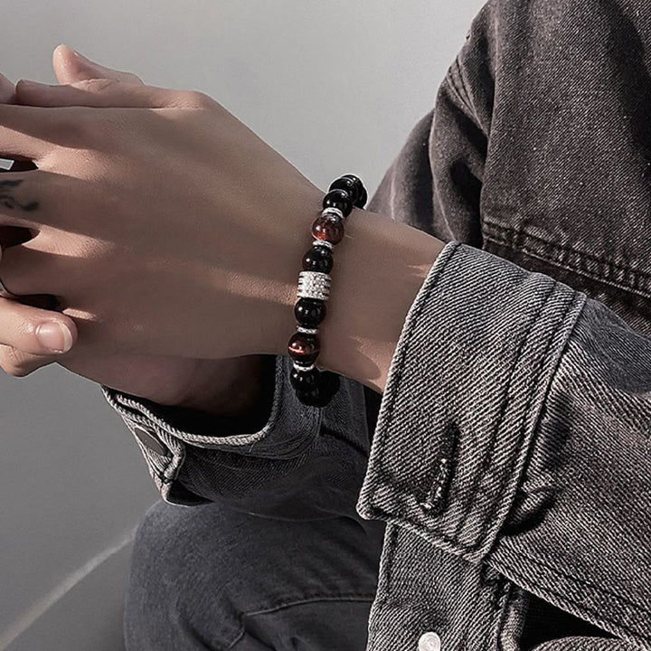 Bracciale Buddha Stones in ossidiana nera naturale con occhio di tigre e forza
