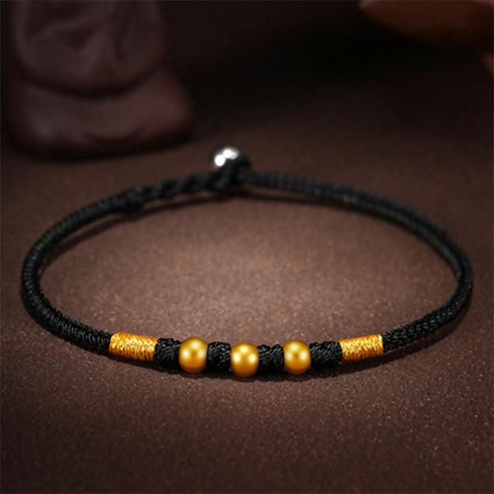 Braccialetto di protezione intrecciato fatto a mano con nodo King Kong, perline d'oro 999 Buddha Stones
