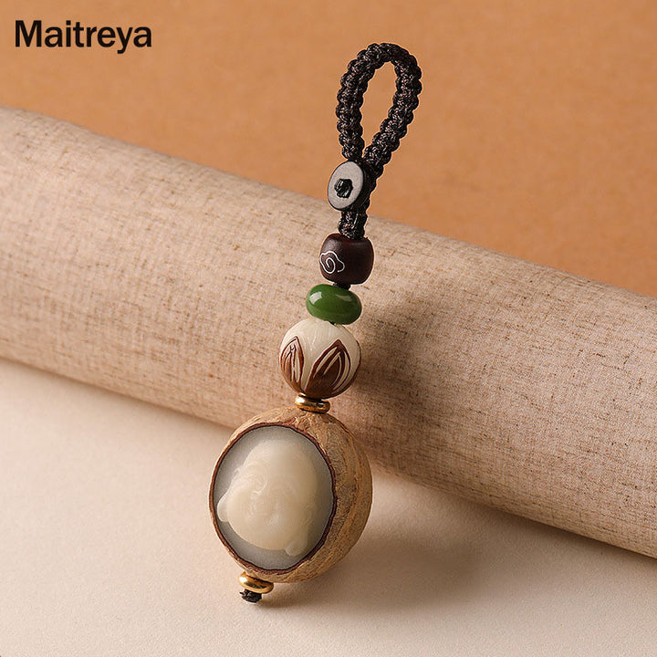 Portachiavi con decorazione Buddha Stones semi di Bodhi