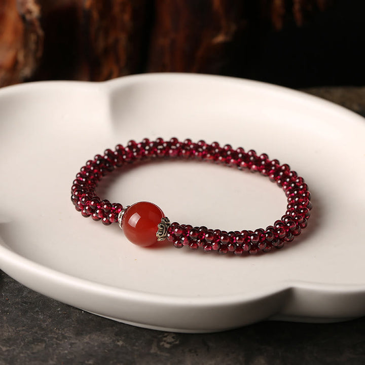 Braccialetto di protezione con perline di agata rossa, cristallo rosa e granato naturale Buddha Stones