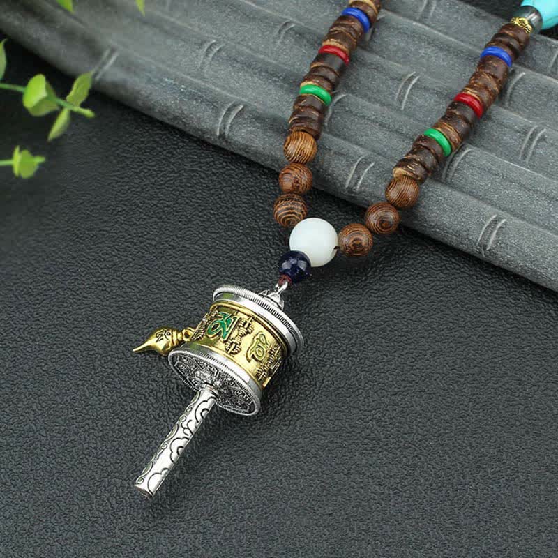 Buddha Stones Tibetano Om Mani Padme Hum Ruota della Preghiera Rotazione Vajra Collana Pendente in Legno - Ruota della preghiera d'oro - image 1
