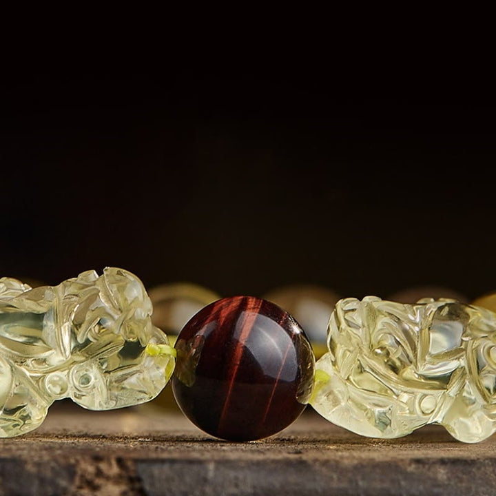 Braccialetto di protezione della prosperità con occhio di tigre PiXiu e citrino naturale Buddha Stones
