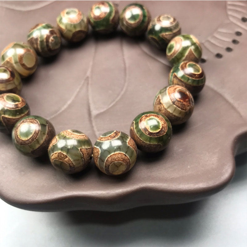 Braccialetto portafortuna in sardonice con perline Dzi a tre occhi Buddha Stones