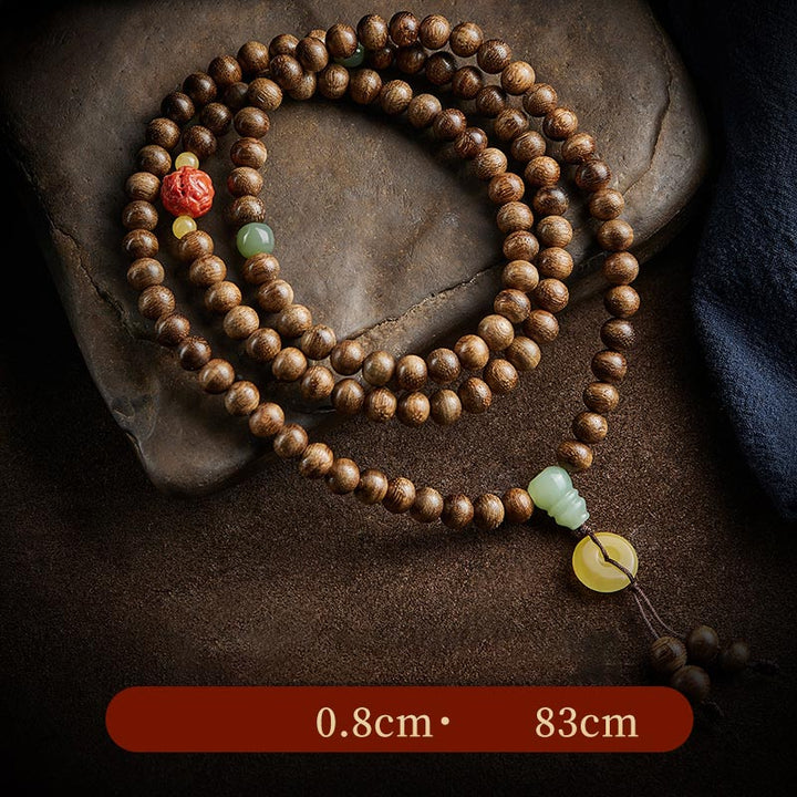 Buddha Stones 108 perle di Mala Kalimantan Agarwood Zucca Giada Ambra Bracciale equilibrio