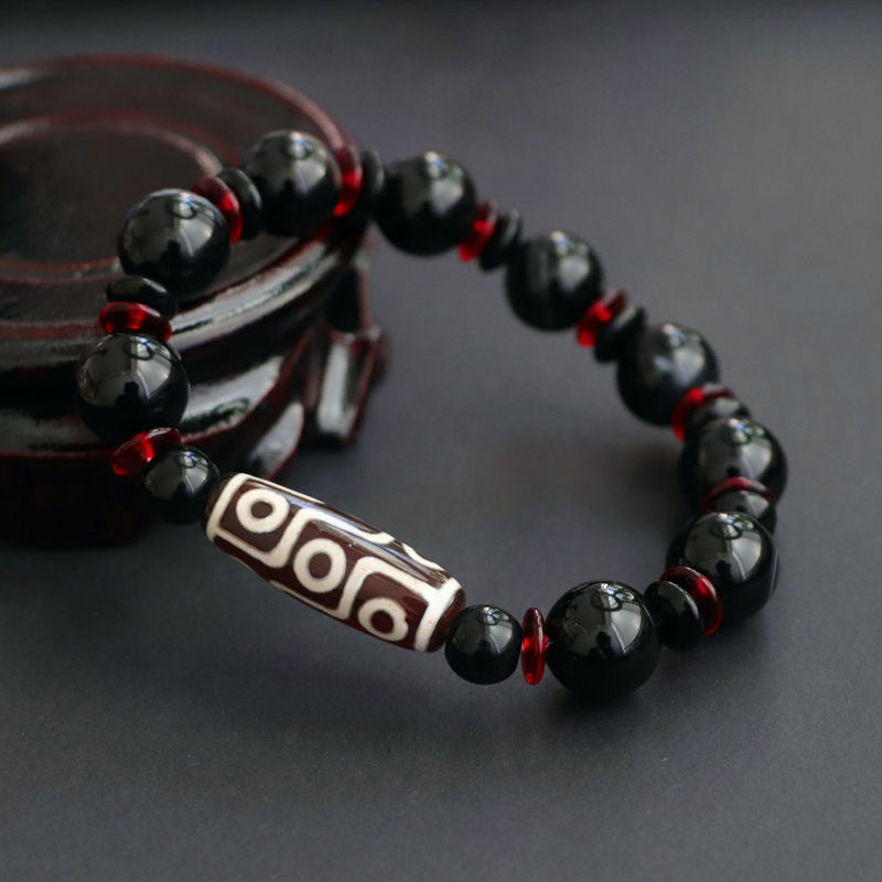Braccialetto di protezione della ricchezza con perline Dzi a nove occhi in onice nero Buddha Stones