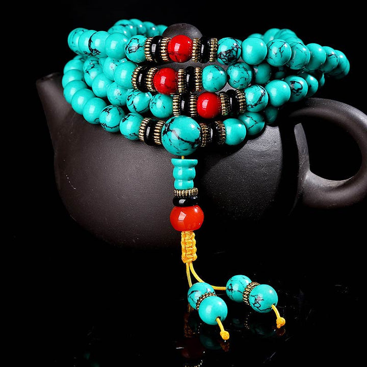 Bracciale Mala di guarigione in turchese tibetano Buddha Stones