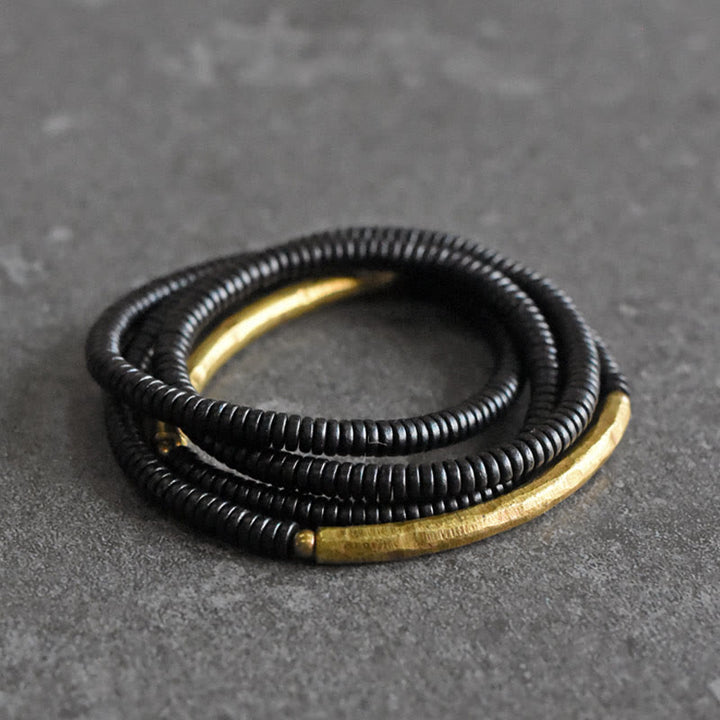 Bracciale multistrato in legno di ebano e rame Buddha Stones Balance