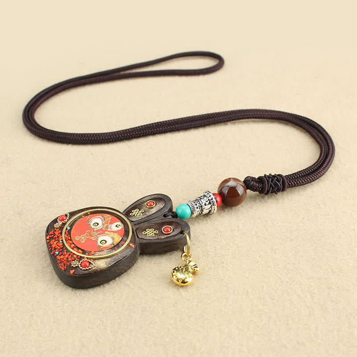 Collana pendente Thangka con cinque divinità della ricchezza in ebano tibetano