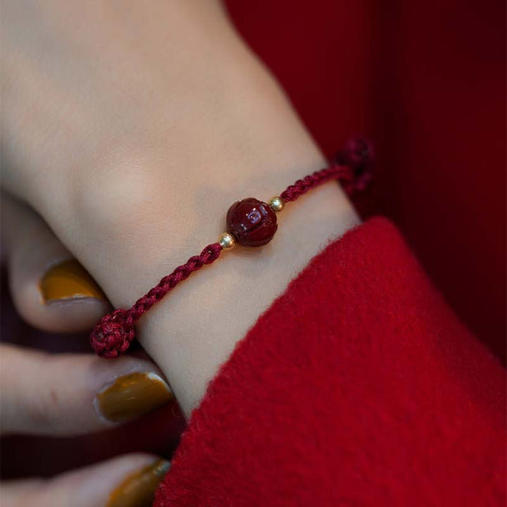 Braccialetto intrecciato con corda rossa calma, giada, cinabro e loto Buddha Stones