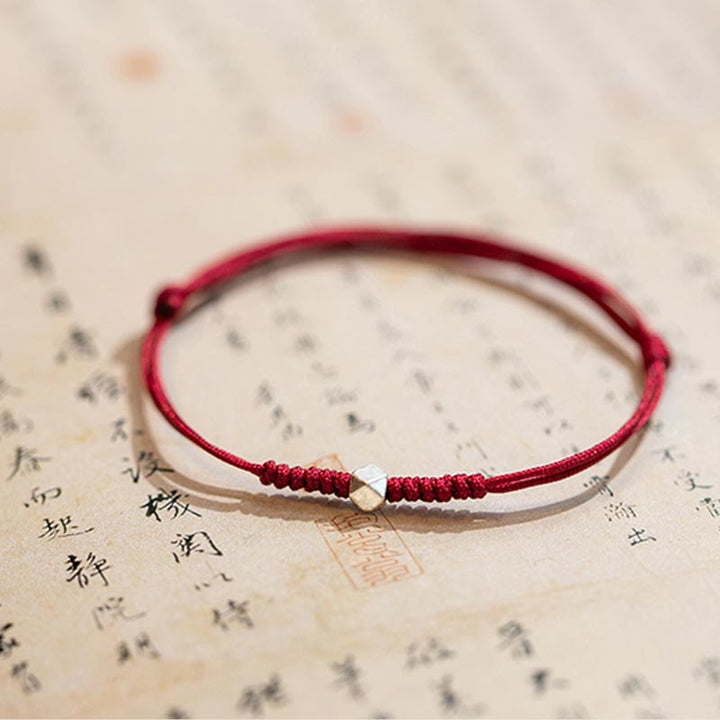 Braccialetto intrecciato con cordino rosso in argento sterling 925 Buddha Stones Luck Bead Protection