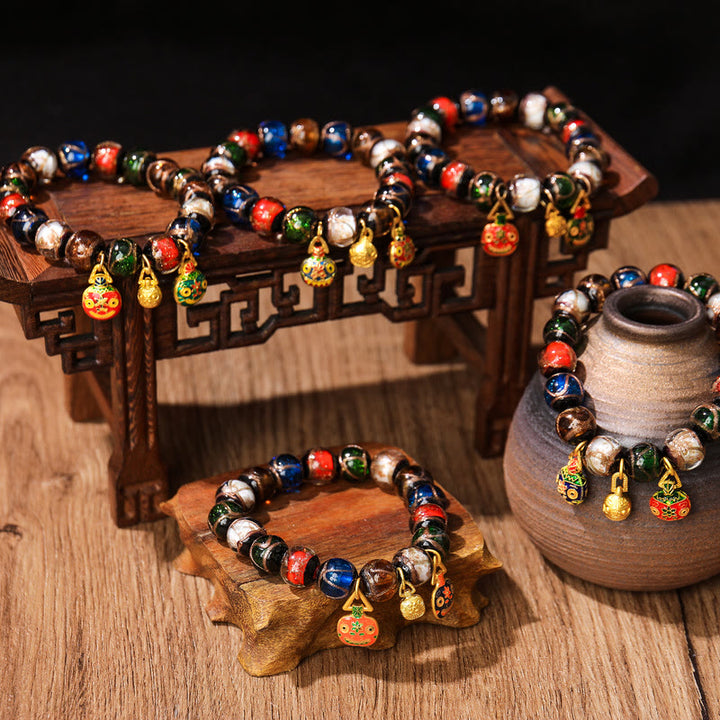 Buddha Stones Cinque Elementi Oro Bestia che deglutisce Fascino Famiglia Braccialetto Portafortuna con Perline di Vetro Liuli