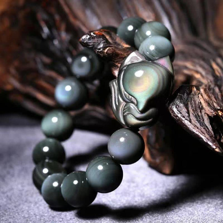Braccialetto positivo di guarigione della volpe di ossidiana arcobaleno Buddha Stones