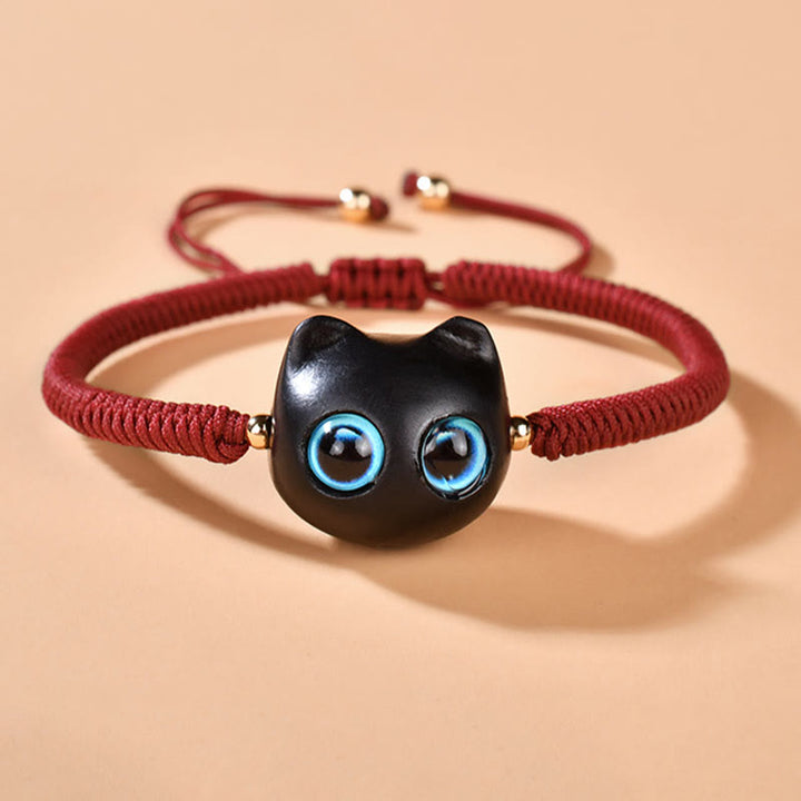 Bracciale intrecciato con motivo a testa di gatto in legno di ebano Buddha Stones, nodo di King Kong della pace - image 4