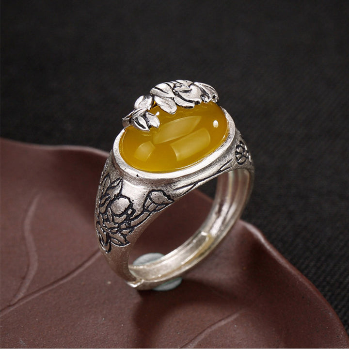 Anello regolabile con protezione e benedizione del loto in citrino Buddha Stones