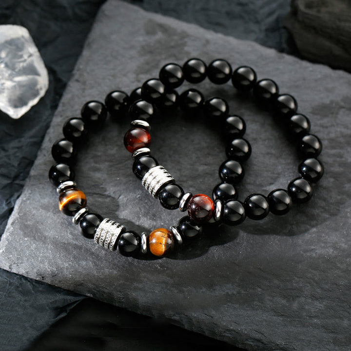 Bracciale Buddha Stones in ossidiana nera naturale con occhio di tigre e forza
