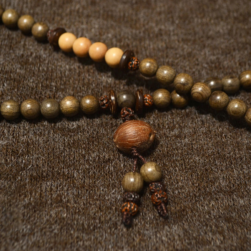 Bracciale Mala con ciondolo di protezione in legno di sandalo tibetano Buddha Stones