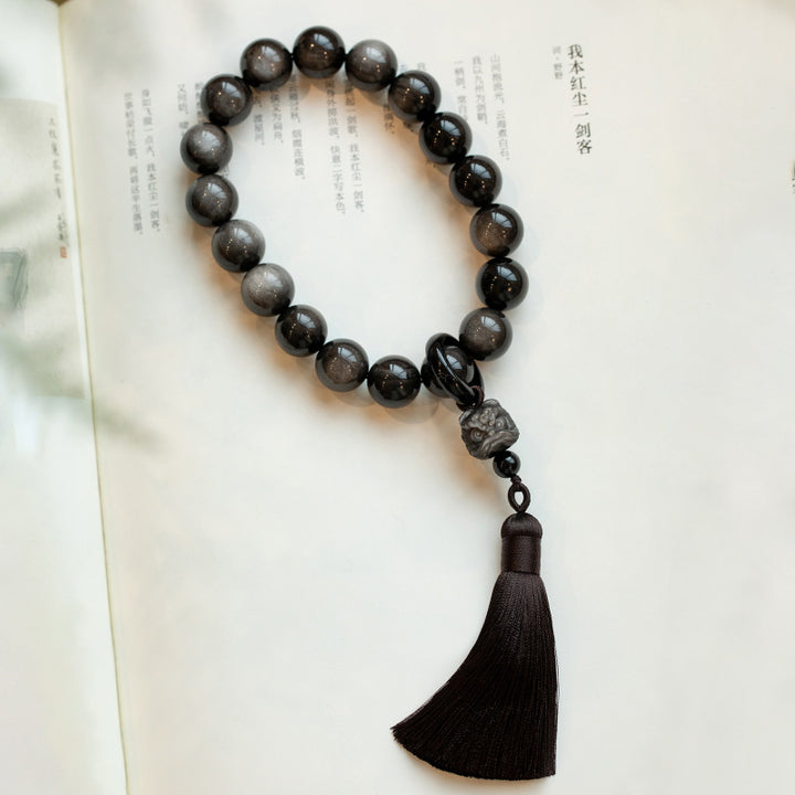 Buddha Stones Argento naturale Ossidiana lucida Ossidiana nera Leone Mala da polso Protezione Nappe Mala tascabile Decorazione per auto