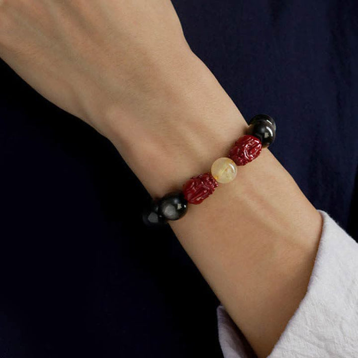 Braccialetto di protezione Om Mani Padme Hum in ossidiana lucida dorata Buddha Stones PiXiu Cinnabar