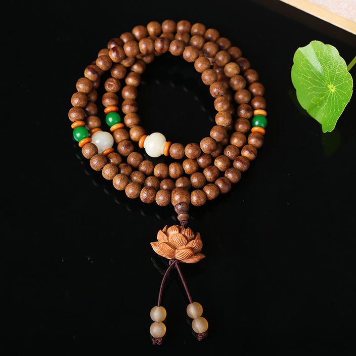 Buddha Stones 108 Mala Beads Legno di Pesca Bodhi Seed Lotus Preghiera Meditazione Bracciale