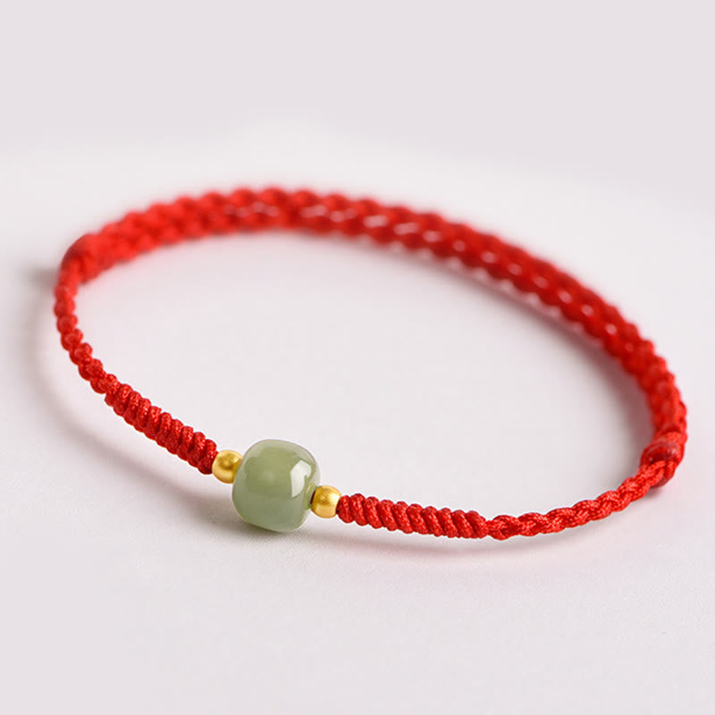 Bracciale intrecciato con Buddha Stones e portafortuna