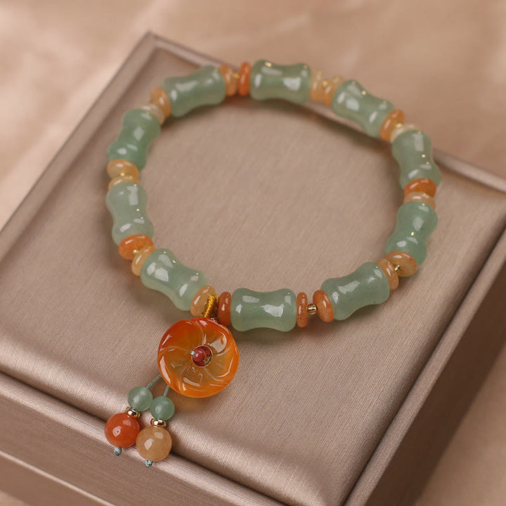 Braccialetto della fortuna con motivo a fiori di bambù e giada naturale Buddha Stones