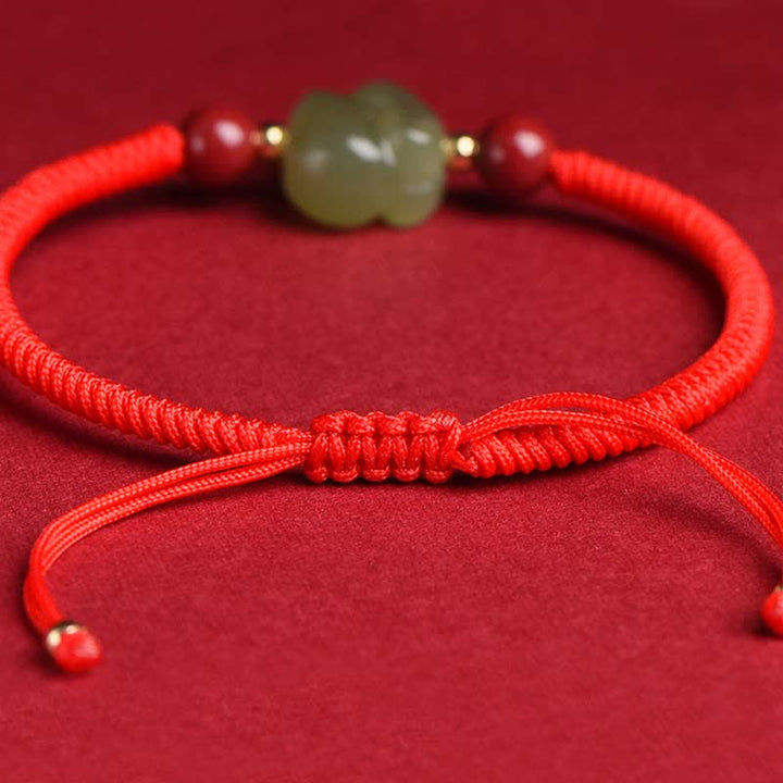 Braccialetto di corda dell'abbondanza di perline di cinabro con coniglietto di giada di Hetian dell'anno del coniglio