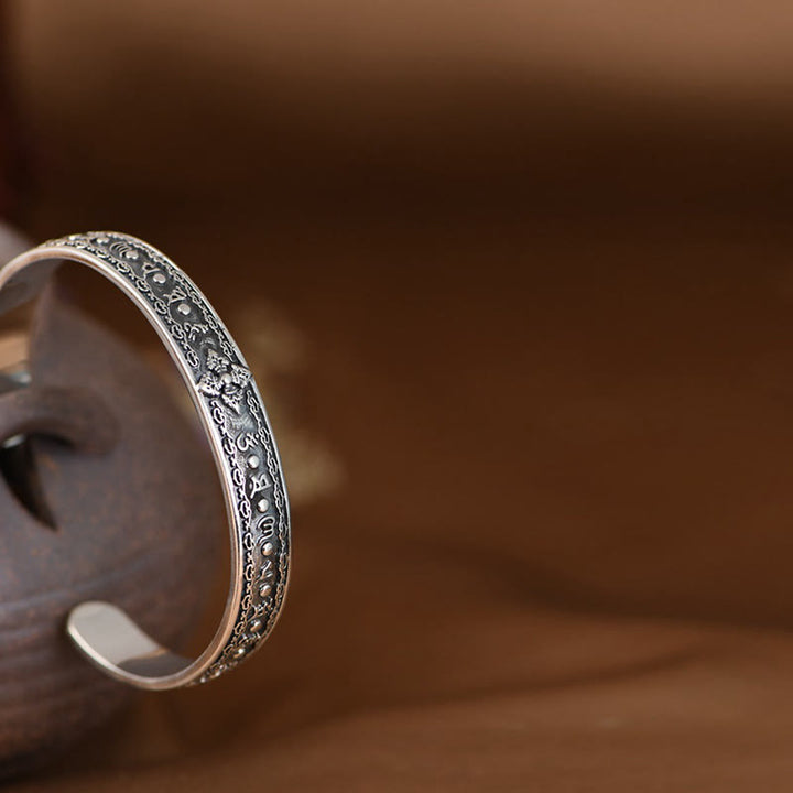 Bracciale rigido con Buddha Stones in argento sterling 925 Om Mani Padme Hum con doppio Dorje inciso e saggezza