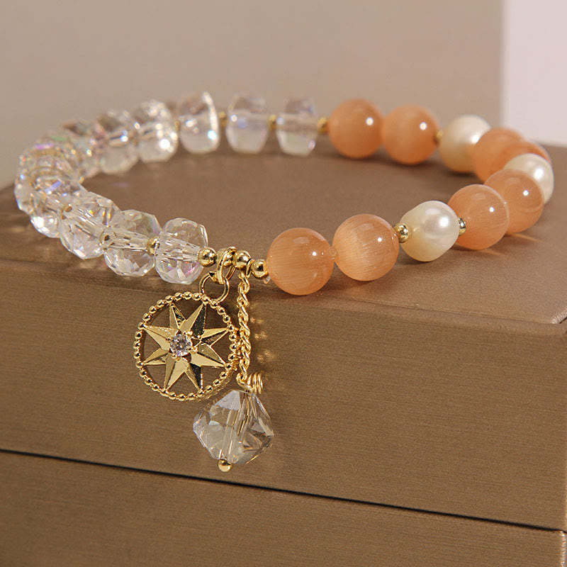 Braccialetto di supporto con stella di cristallo bianco e occhio di gatto arancione Buddha Stones