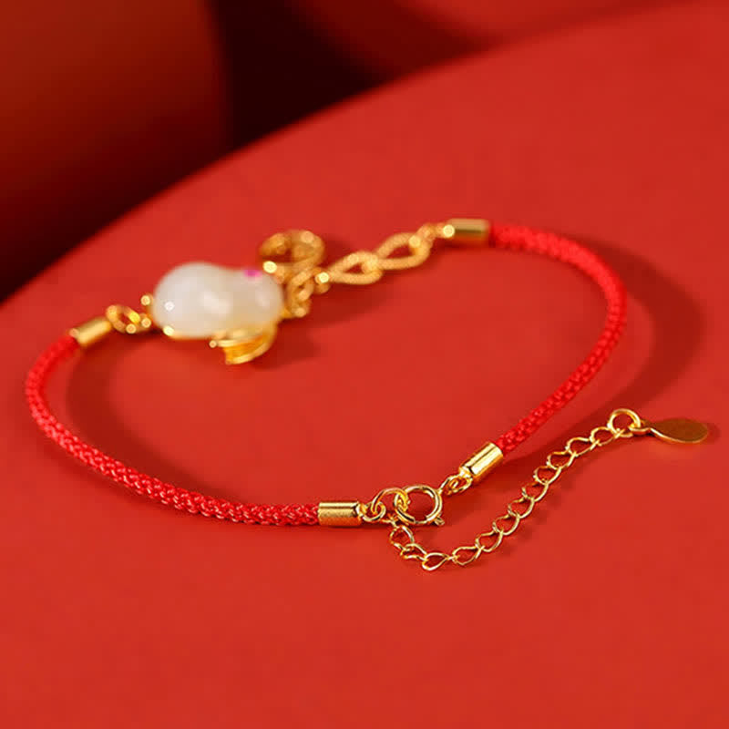 Braccialetto in argento sterling 925 con cordino rosso e giada bianca Hetian dell'anno del coniglio