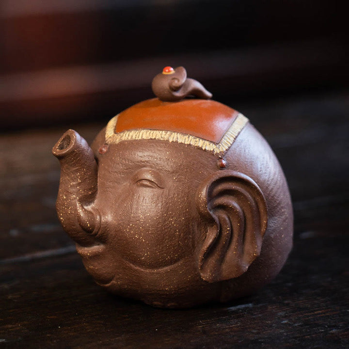 Teiera in ceramica viola con Buddha Stones, elefante carino e nuvole di buon auspicio
