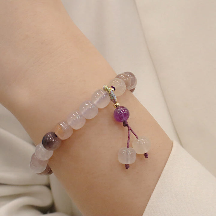 Braccialetto di perline con ciondolo a forma di fiore viola dorato naturale di seta Buddha Stones