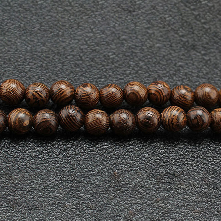 Collana con ciondolo in pietra turchese, pietra di legno di wenge, protezione e calma Buddha Stones