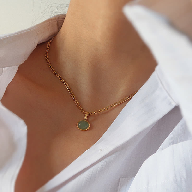 Collana con ciondolo in acciaio al titanio con resistenza turchese ovale