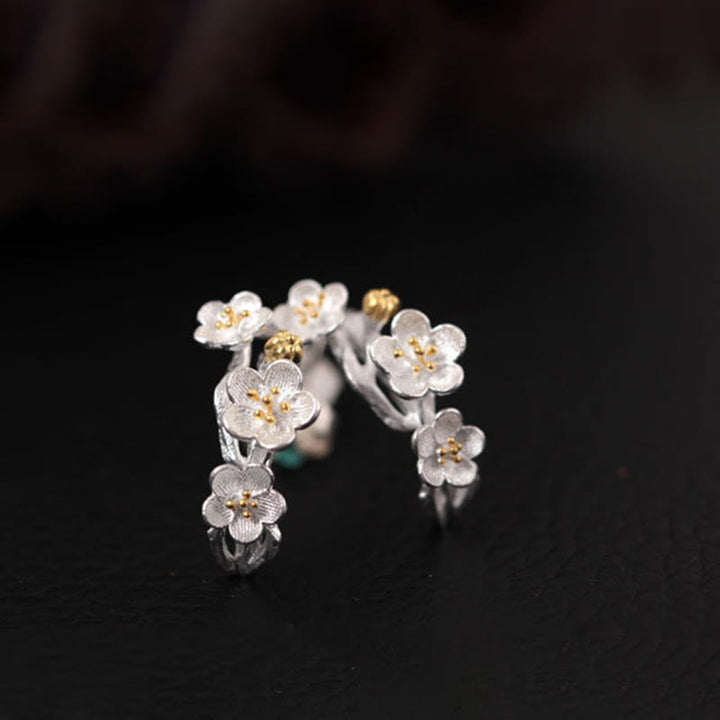Orecchini Buddha Stones in argento sterling 925 con fiori di prugna e benedizione floreale