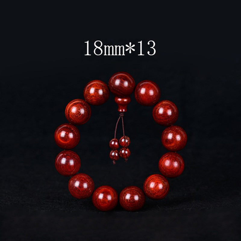 Braccialetto di equilibrio in legno di sandalo rosso con foglia piccola tibetana Buddha Stones