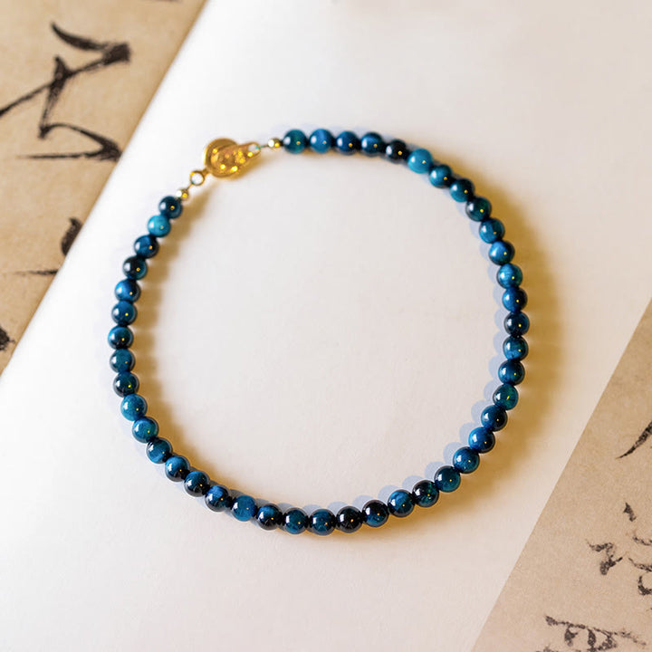 Braccialetto di protezione con catena in pietra naturale occhio di tigre blu Buddha Stones