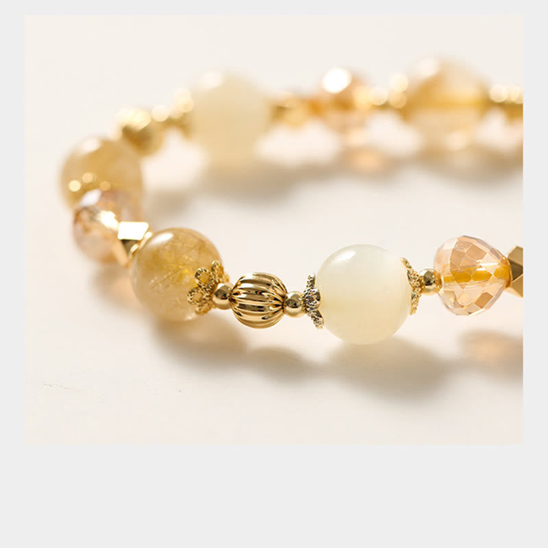 Braccialetto con ciondolo fortunato con campanella della ricchezza in quarzo rutilato dorato placcato oro 14K Buddha Stones
