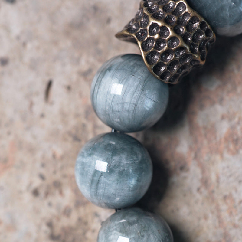 Braccialetto di coppia di fiducia in pietra occhio d'aquila in legno di ebano e Buddha Stones