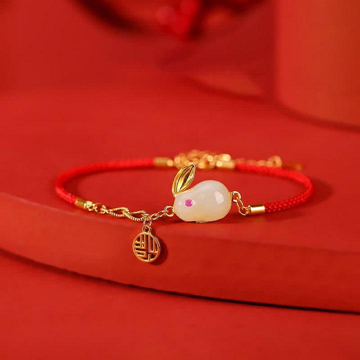 Braccialetto in argento sterling 925 con cordino rosso e giada bianca Hetian dell'anno del coniglio