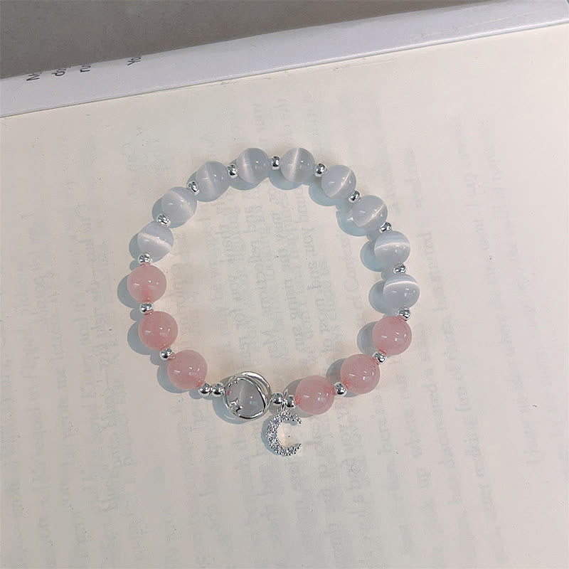 Braccialetto con ciondolo a forma di luna e cristallo rosa occhio di gatto naturale Buddha Stones