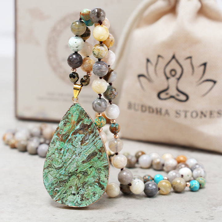 Collana di perline di guarigione in diaspro Picasso naturale dell'oceano Buddha Stones