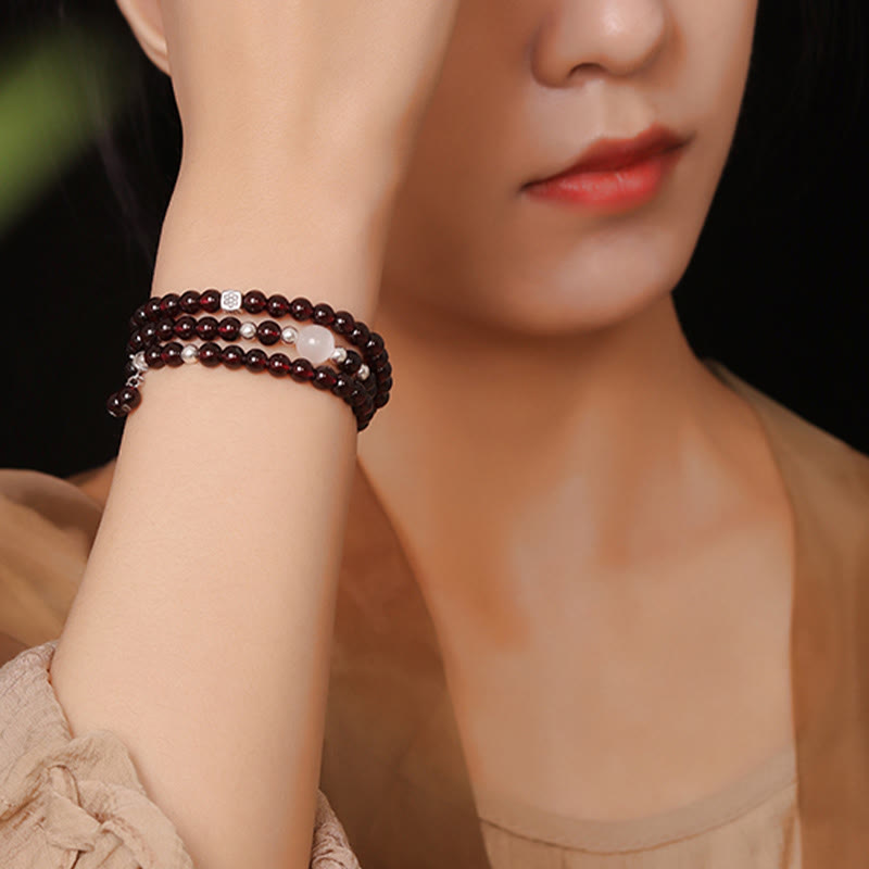 Braccialetto triplo giro Buddha Stones in argento sterling 925 con granato naturale e protezione per gli occhi di gatto