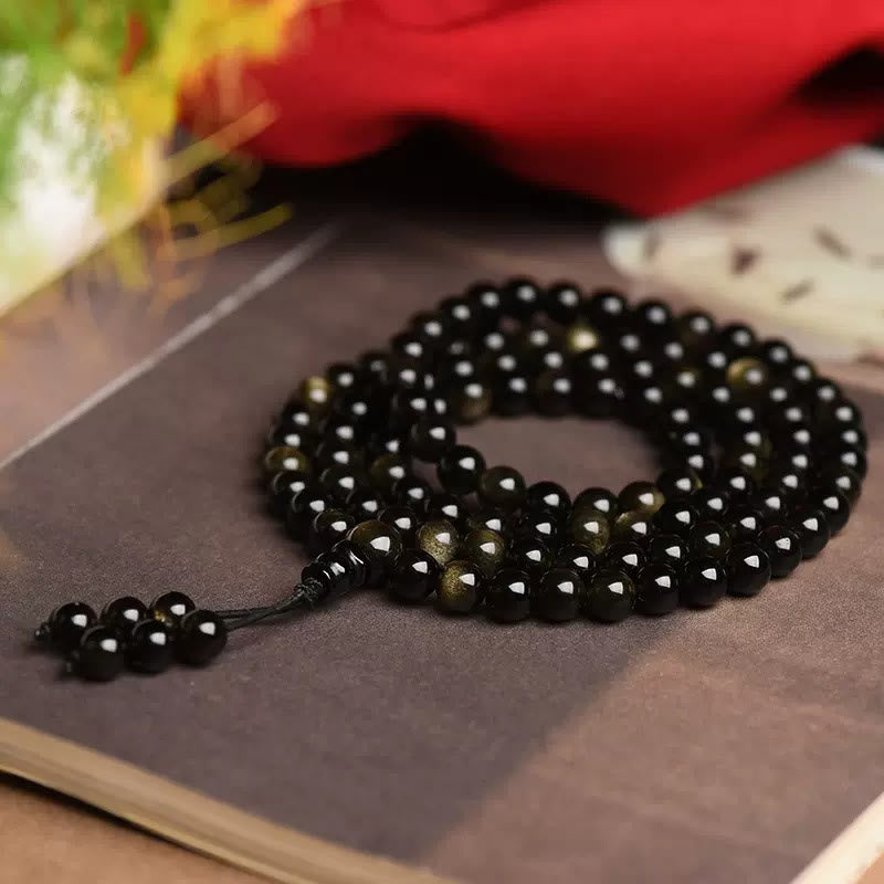 Braccialetto della ricchezza in ossidiana naturale con 108 perle di Mala Buddha Stones