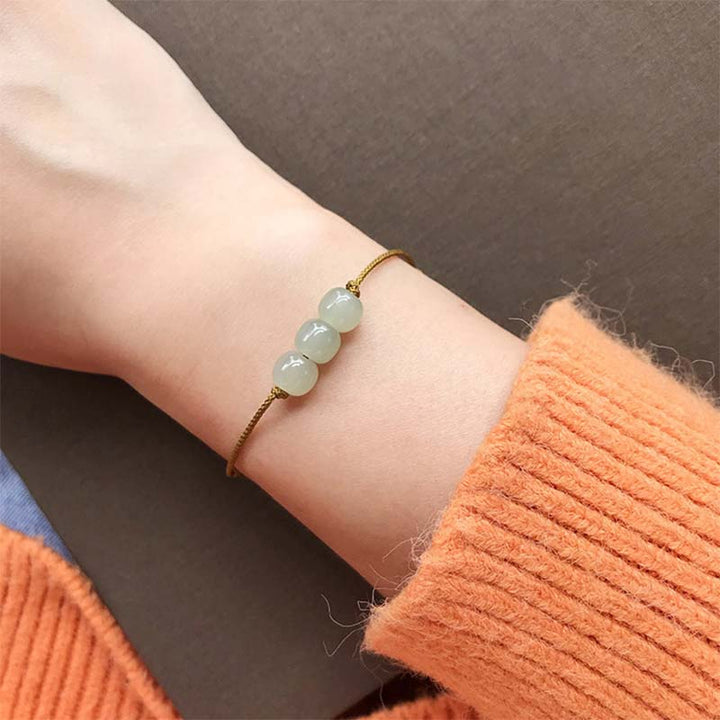 Buddha Stones Braccialetto intrecciato con tre perle di giada portafortuna - image 4