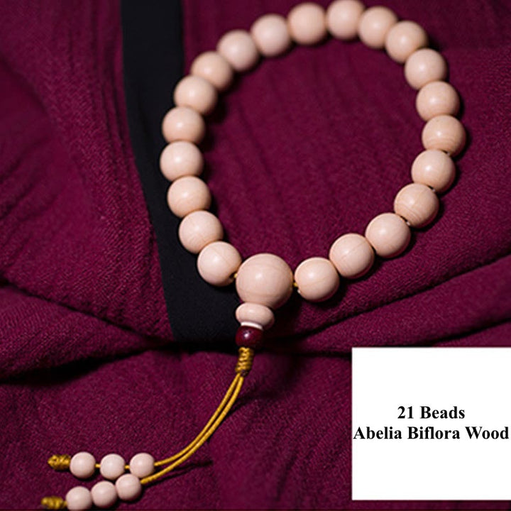 Buddha Stones Naturale Abelia Biflora Legno Benedizione Polso Mala