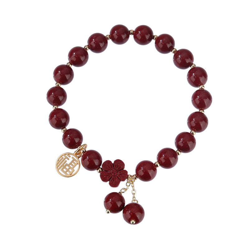 Braccialetto di benedizione con fiori di ciliegio e carattere Fu in pietra di cinabro Buddha Stones