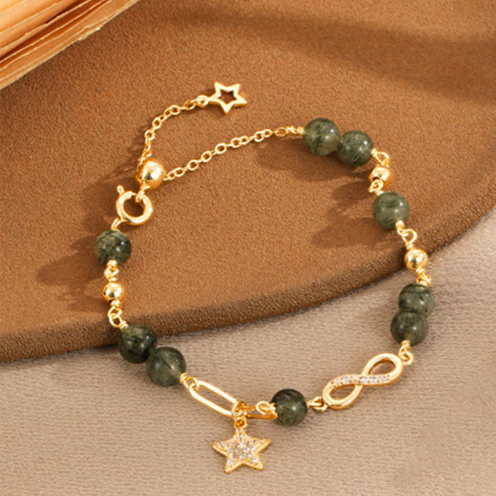 Bracciale Buddha Stones in oro 14K con quarzo rutilato verde e anello Möbius, protezione della stella dell'amore eterno