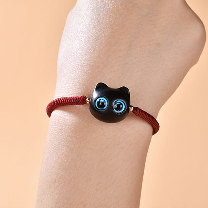 Bracciale intrecciato con motivo a testa di gatto in legno di ebano Buddha Stones, nodo di King Kong della pace - image 8