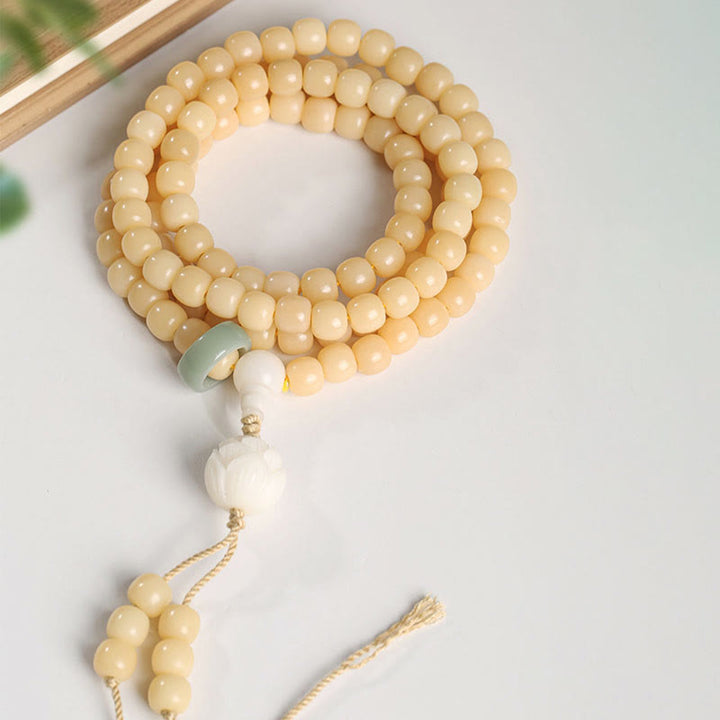 Braccialetto con ciondolo di pace e armonia, perline di loto Dzi, semi di Bodhi naturali , Buddha Stones
