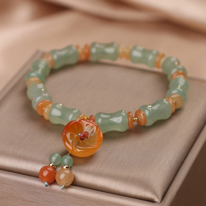 Braccialetto della fortuna con motivo a fiori di bambù e giada naturale Buddha Stones